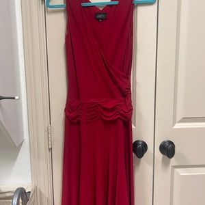 Sleeveless, size 6 red dress below knee length rushed waist